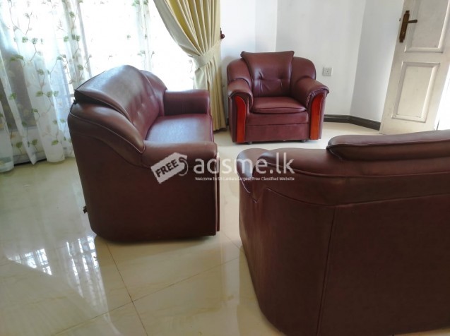 Sofa with glass coffee table