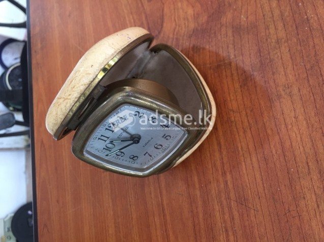 60 years old table clock