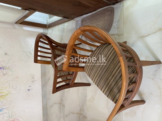 Teak wooden chair with upholstery