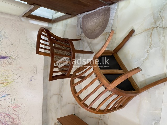 Teak wooden chair with upholstery