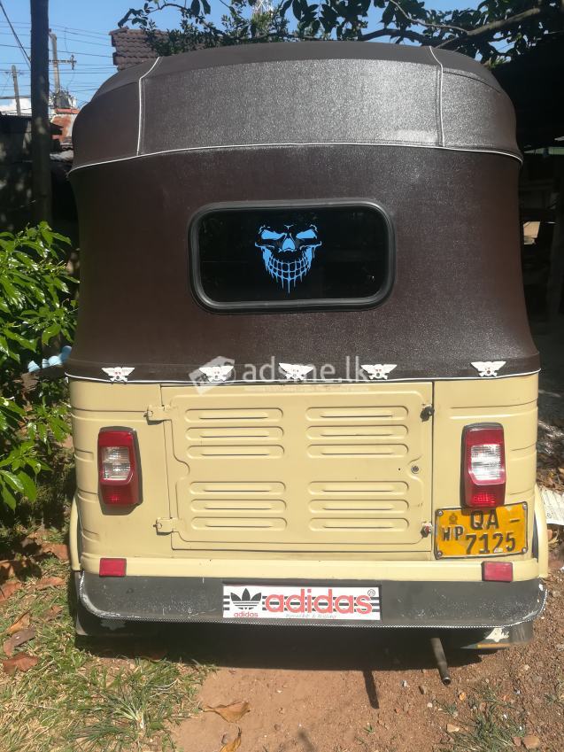 QA Three Wheeler