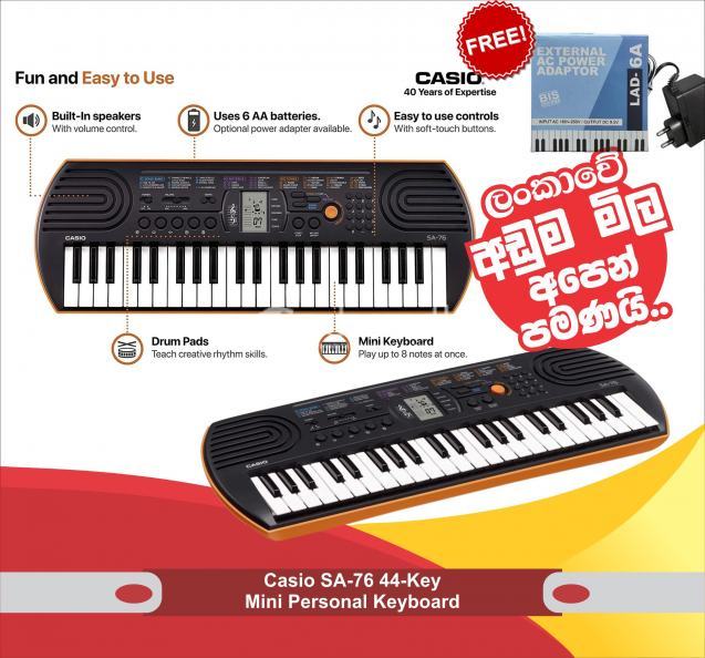 Casio Mini Portable Keyboard - SA-76 With Power Adaptor Casio LAD 6 Adaptor (9.5 V)