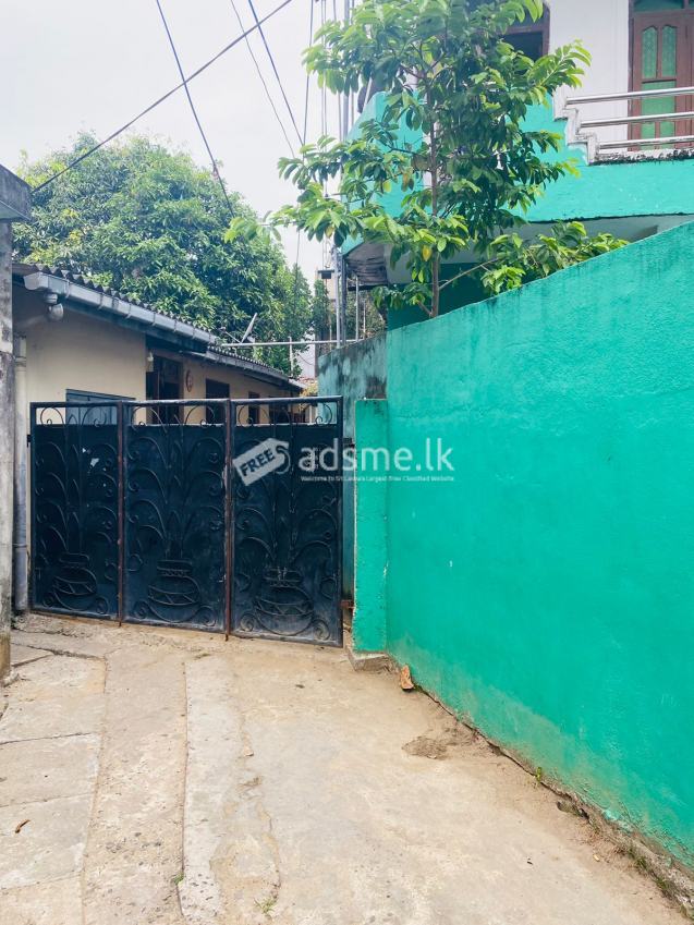 Land with house for sale