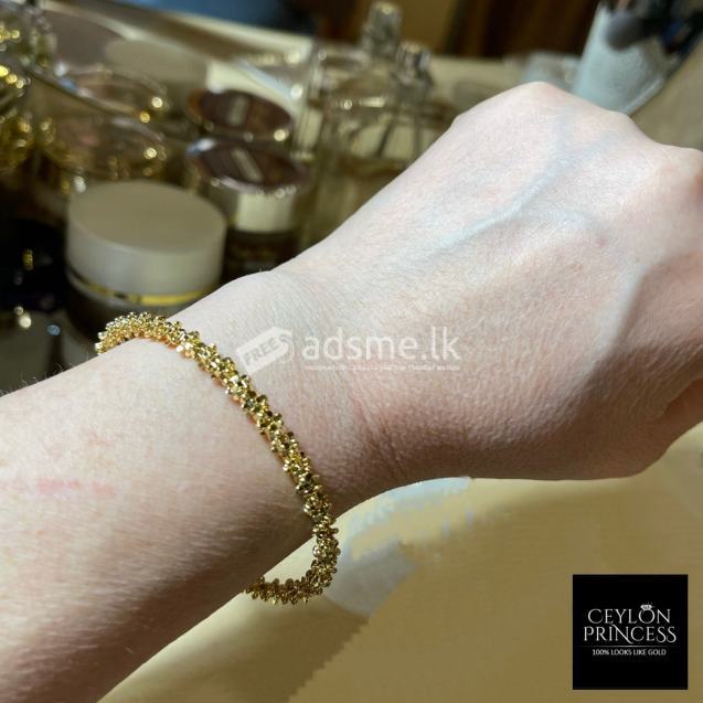 Gold Design Plated Mondial Bangle Bracelet