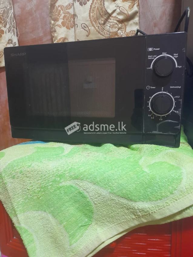 SHARP MICROWAVE OVEN R-20A0 - BRAND NEW