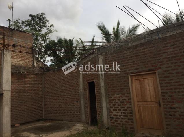 Land,Half Finished house with Big Work shop