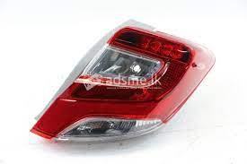 TOYOTA LAMPS NEW GENUINE  AND BUMPER 161/165