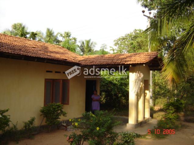 House with two other lots of land for sale