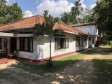 50 perch land with a tourist guest house for sale in tangalle beach area