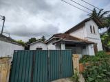 A building with an upstair for long-term rent or lease, facing the Kaduwela-Hanwella